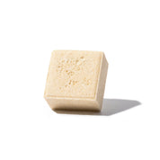 yogh hair baby shampoo bar with yoghurt and oats outside of box on white background