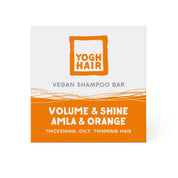 yogh hair volume and shine vegan shampoo bar with amla and orange on white background