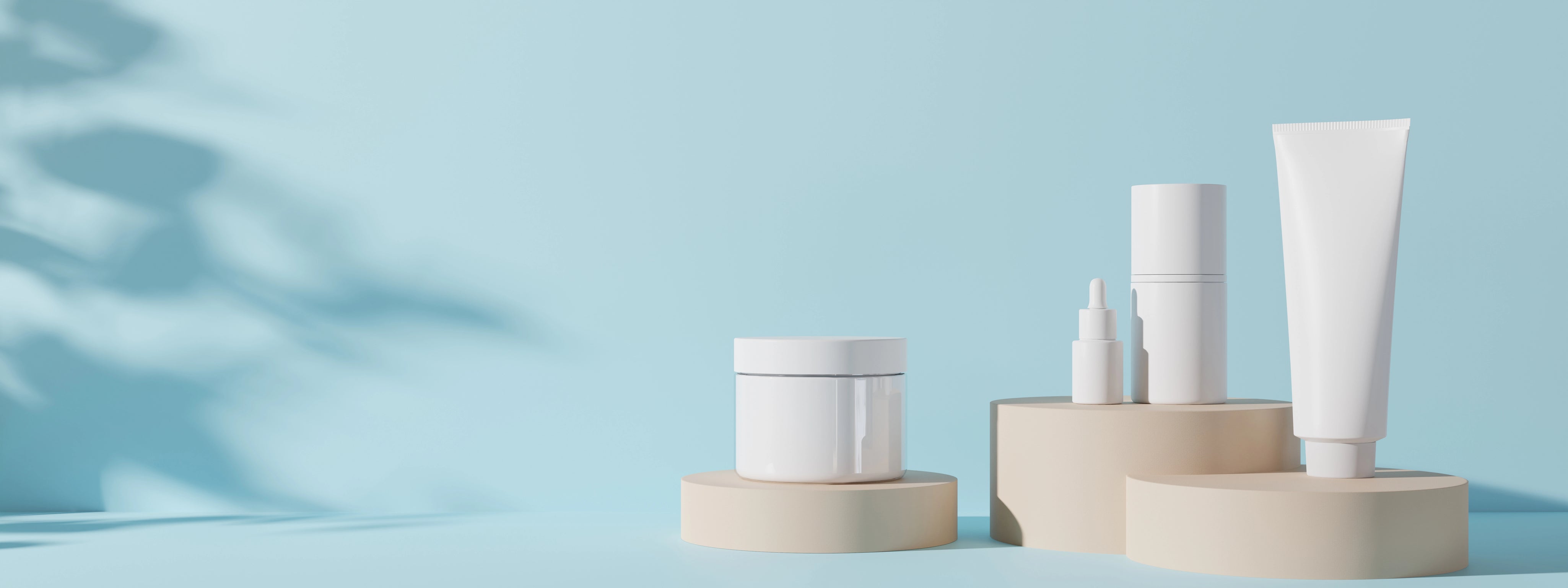 cosmetics with plastic packaging on blue background