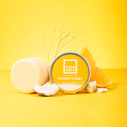 yoghhair hair mask bounce and boyd with its active ingredients on yellow background