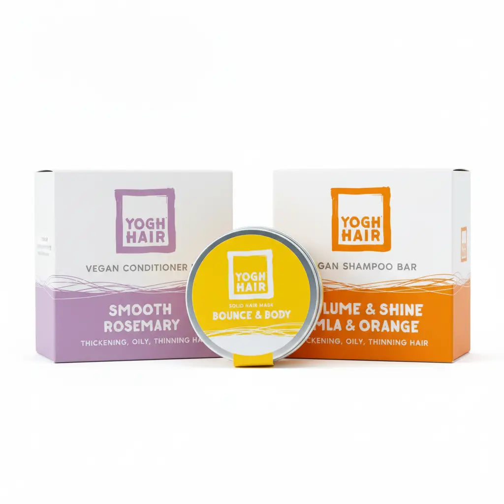 the three products composing the strong hair yoghhair bundle on a white background. the volume shampoo, the thickening conditioner and the hair mask.